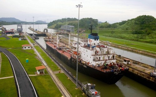 A Cargo ship leaves the Panama Canal Miraflores locks, heading toward the Pacific Ocean, in Panama C..